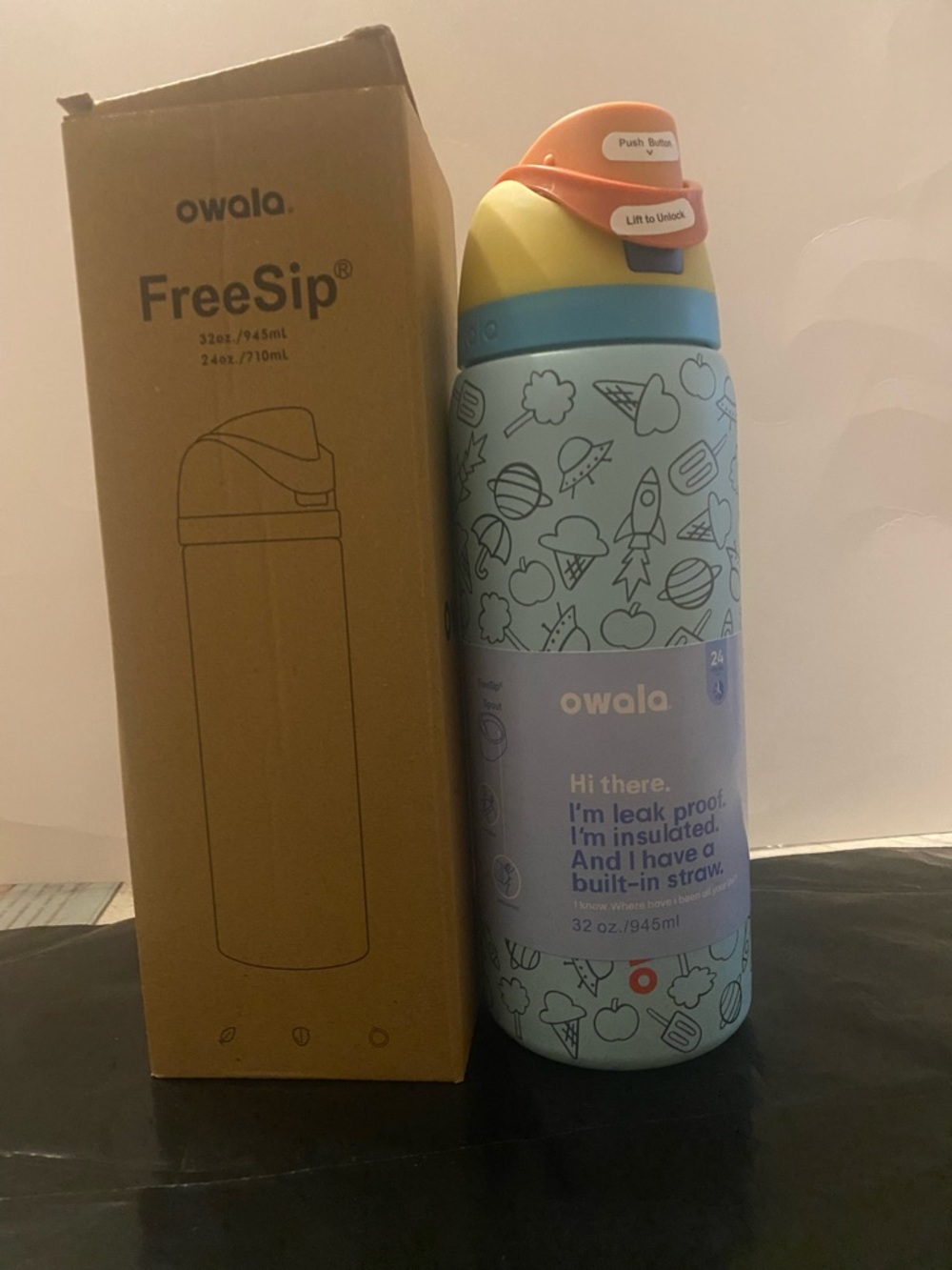 Owala FreeSip Insulated Water Bottle - Light Blue with Yellow & Coral Top